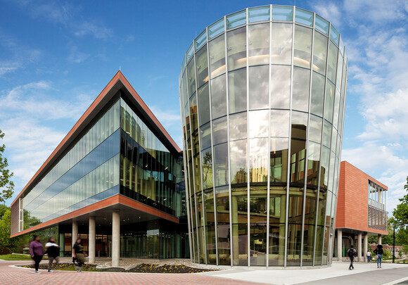 sharp and rounded buildings with custom smart glass windows.