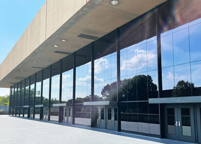 Exterior of building with smart glass windows from left to right. 