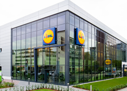 Exterior of Lidl building with custom smart glass windows.
