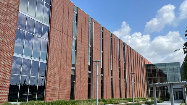 Exterior of brick building with custom smart glass buildings.