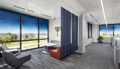 Office lounge with smart glass windows. 
