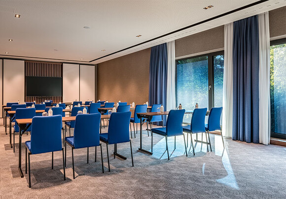 Conference room in the Geneva Marriott Hotel with SageGlass Harmony (tinted state). 