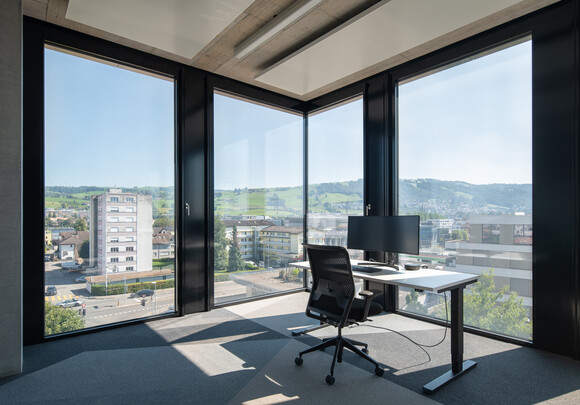 View from the inside of Alpha Building: corner equipped with SageGlass, not tinted. Sunny space. 