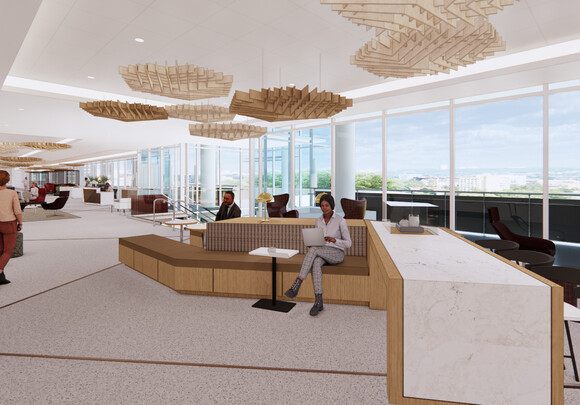 The high-tech connections library provides a collaborative, alternate work space where employees can enjoy unobstructed views.