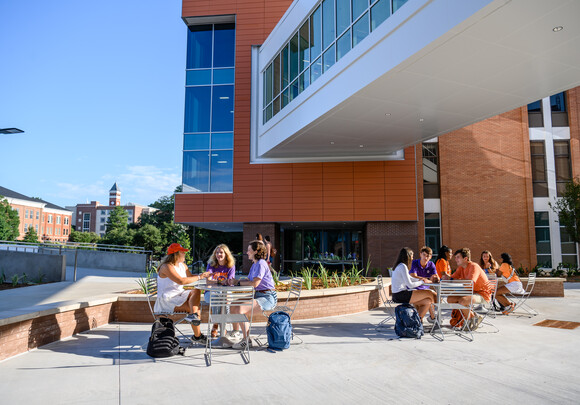 Students congregate at Daniel Hall’s exterior spaces