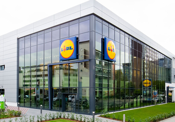 Exterior of Lidl building with custom smart glass windows.